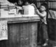 Japan: Post World War II, young boys looking at 'Manga' comics in a bookshop.